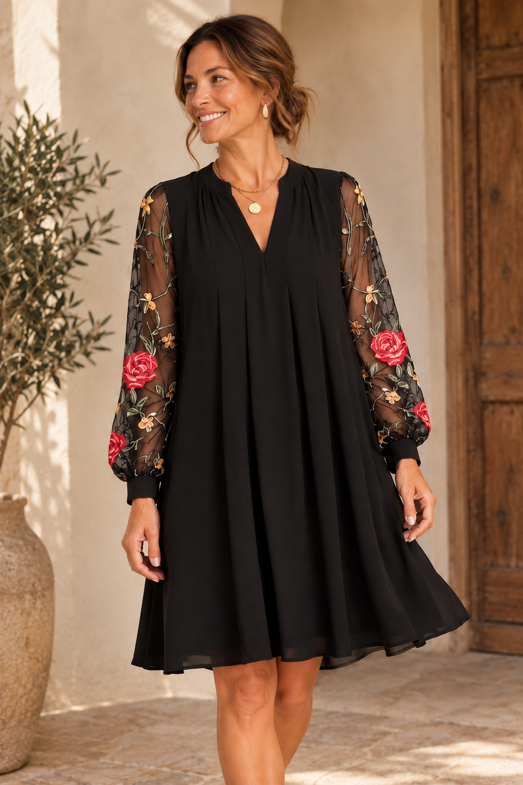 Vestido con escote en V y mangas bordadas