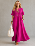 Vestido maxi plisado con escote en V