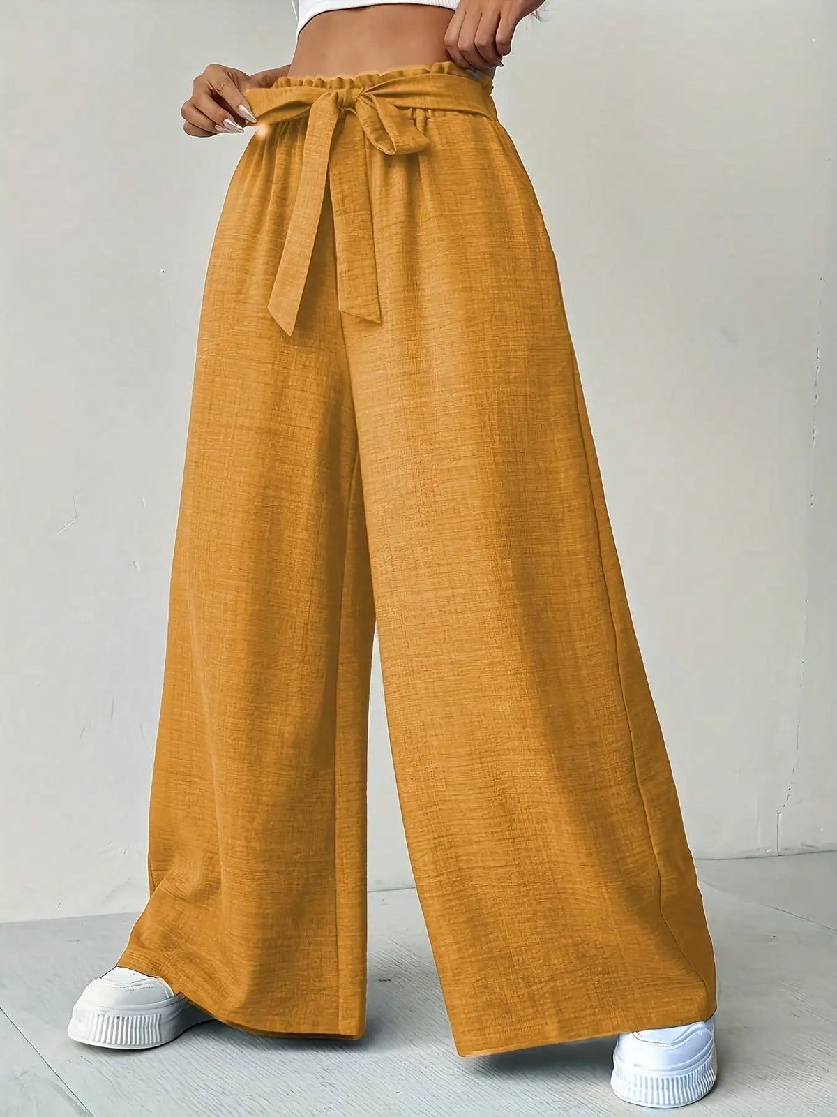 Pantalón ancho de cintura alta con lazo