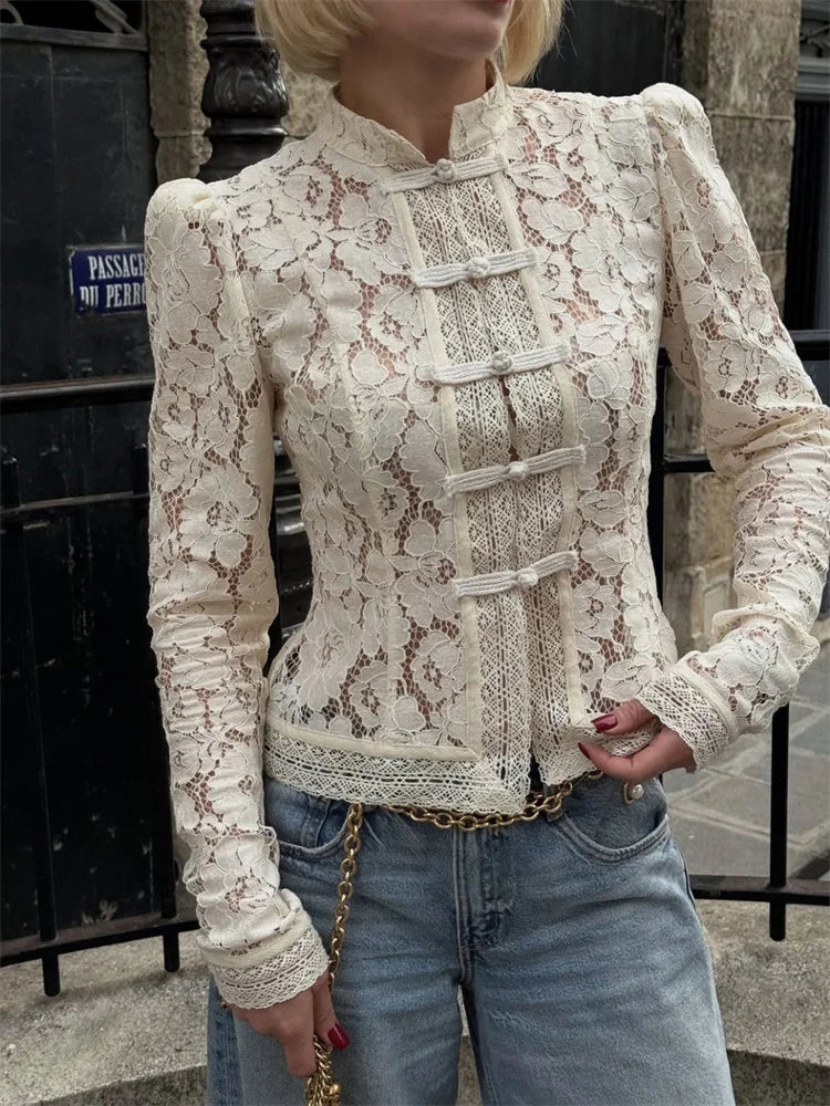 Blusa de encaje con lazadas y cuello mao