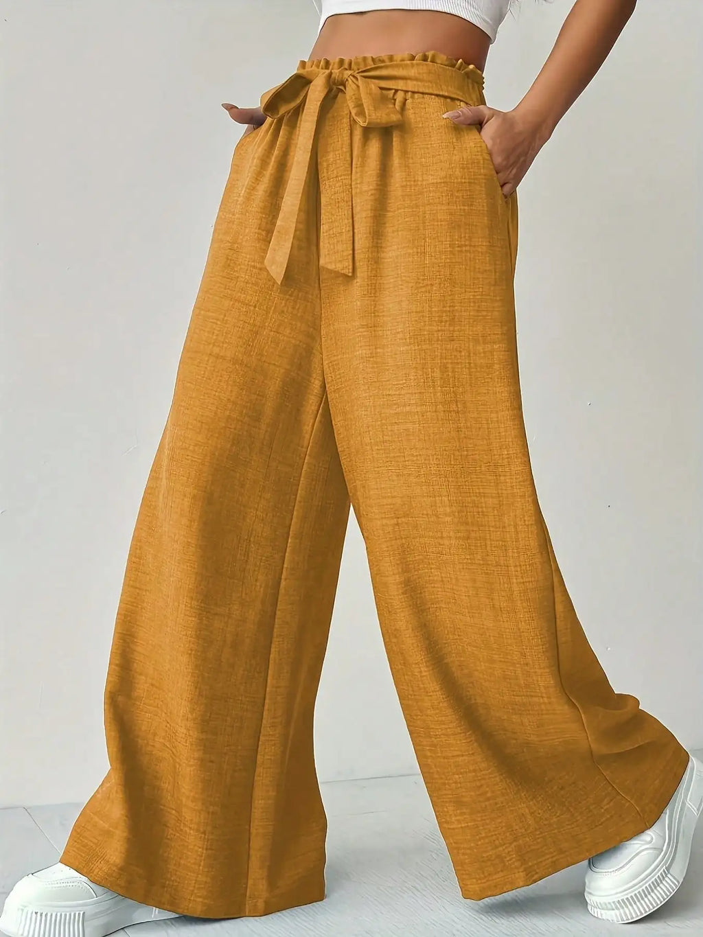 Pantalón ancho de cintura alta con lazo
