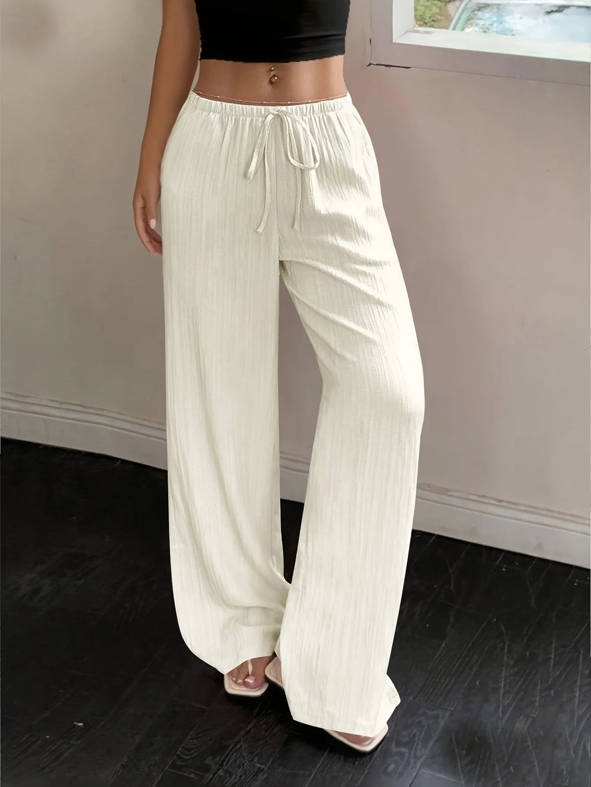 Pantalón ancho texturizado con cintura de cordón