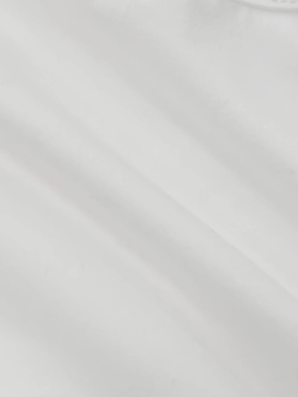 Top de manga larga con fruncido y abertura