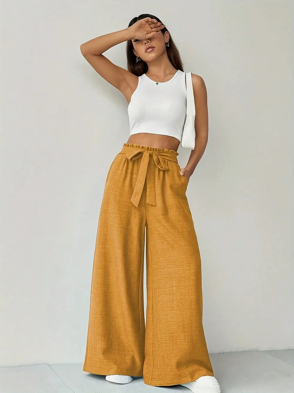 Pantalón ancho de cintura alta con lazo