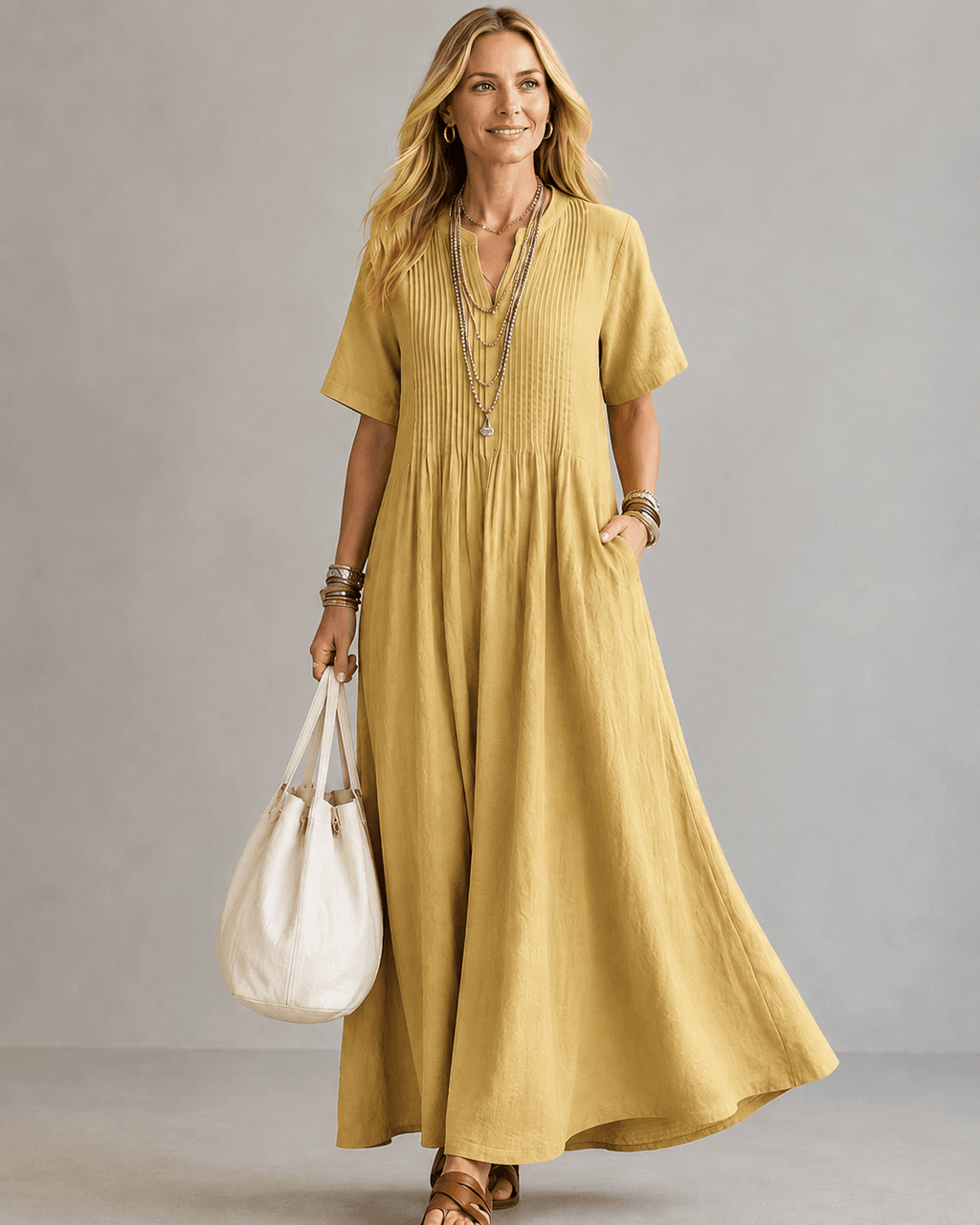 Vestido maxi plisado con escote en V